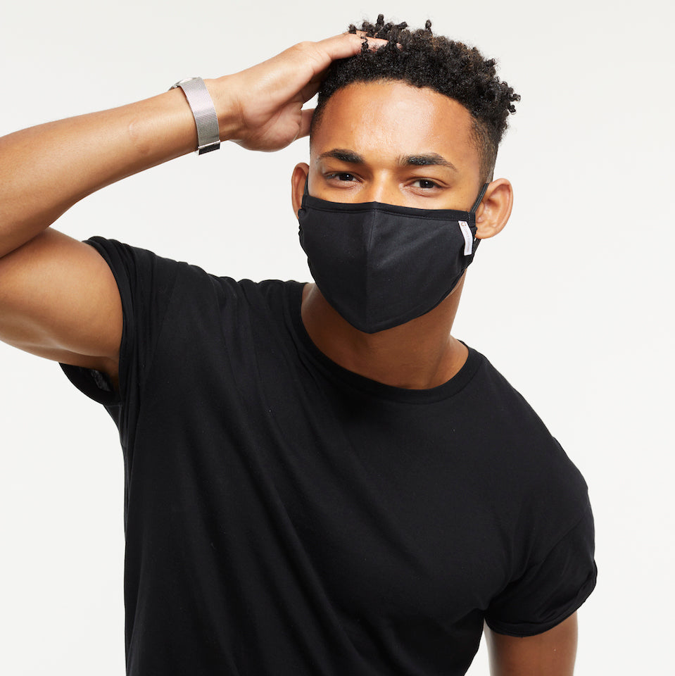 Boy wearing a protective face mask